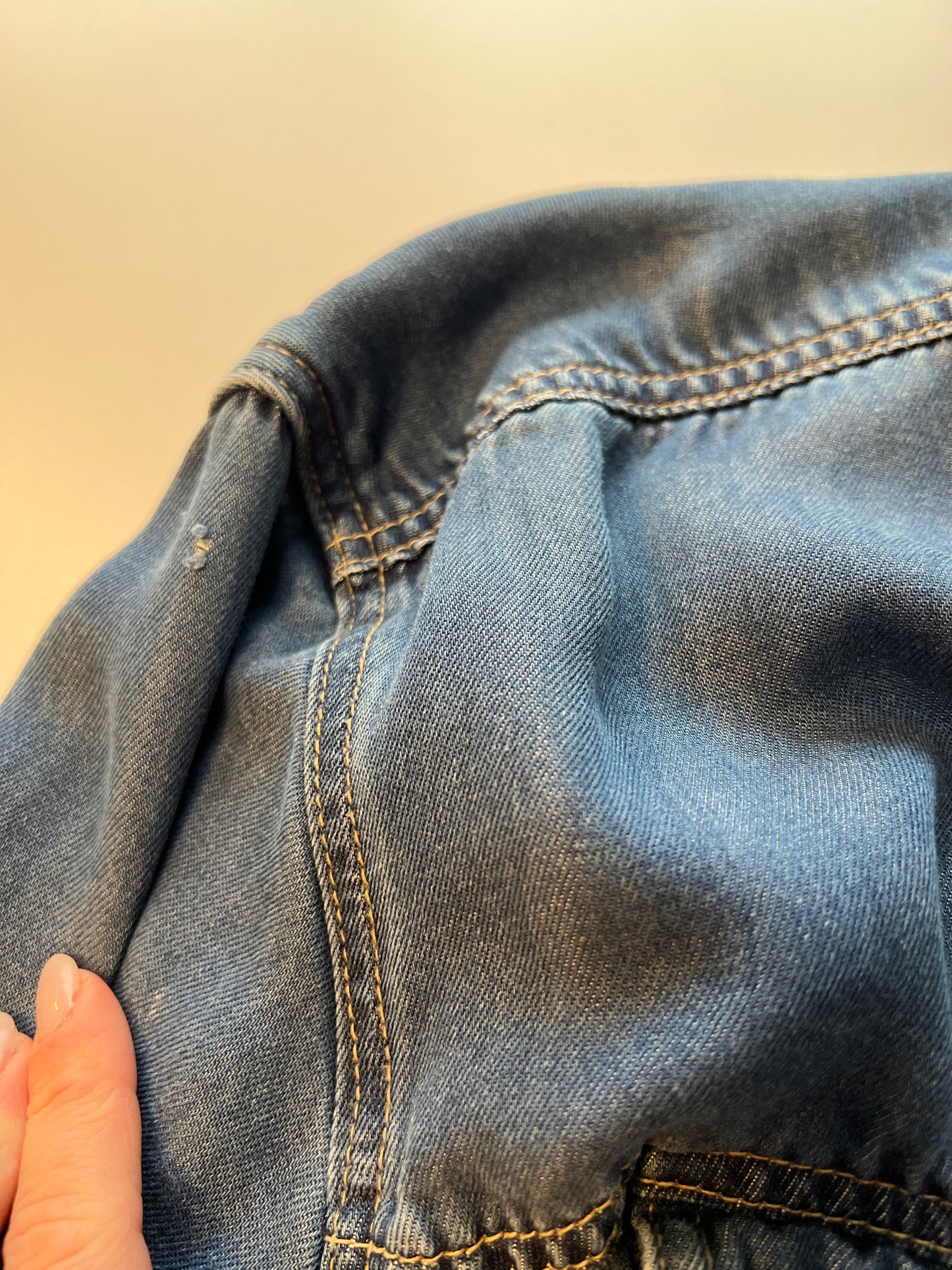 Soft light weight denim with embroidered floral patch