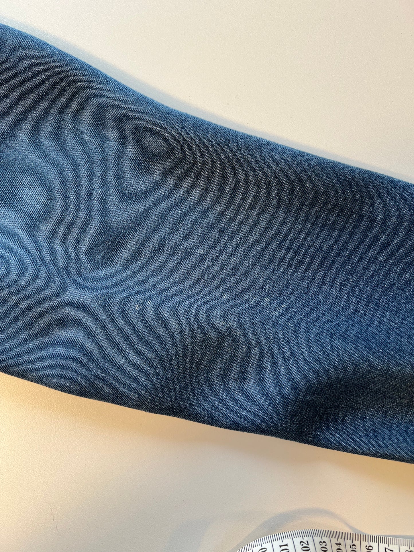 Soft light weight denim with embroidered floral patch