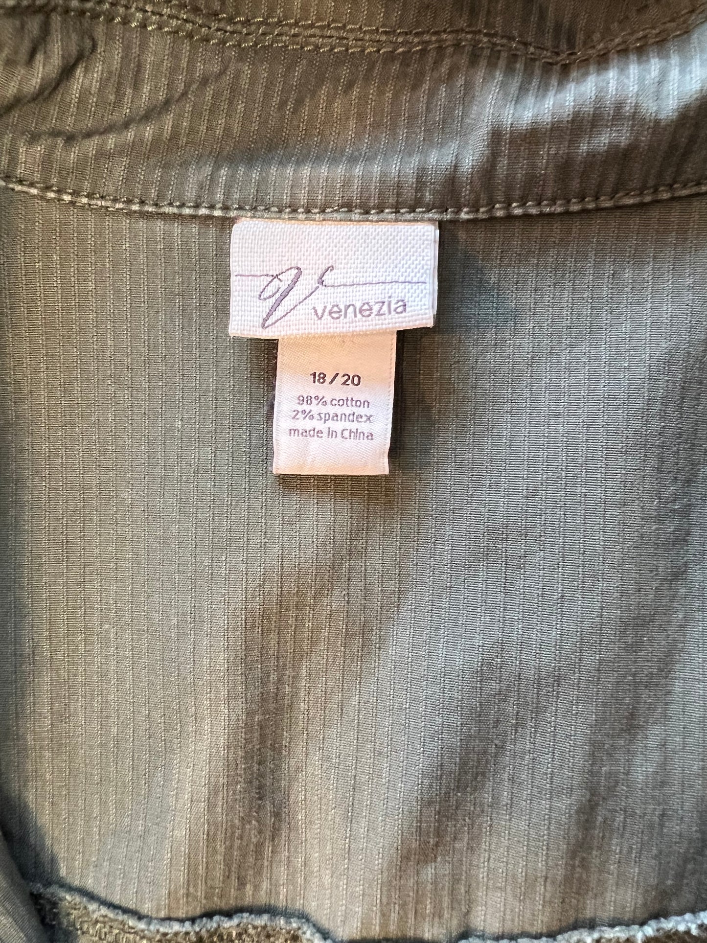 Green jacket with Rick Rack patch