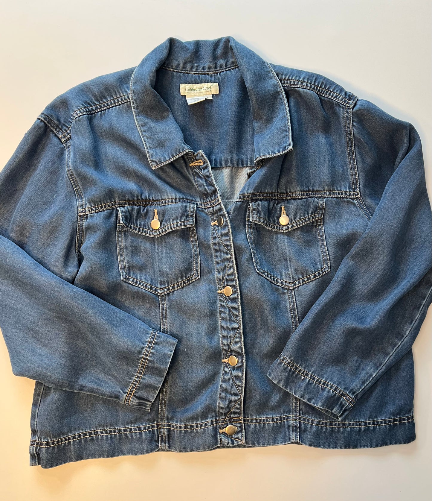 Soft light weight denim with embroidered floral patch