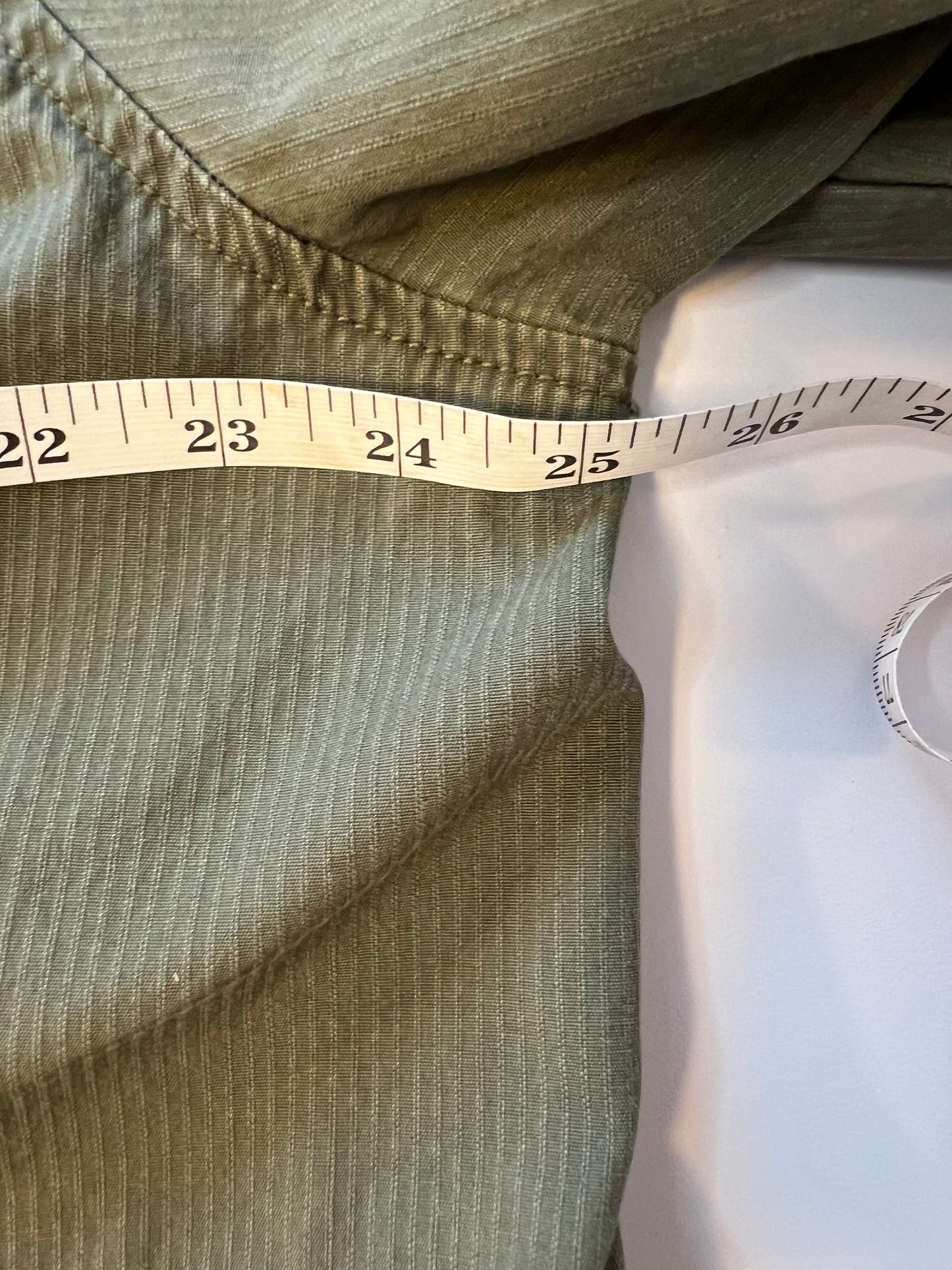 Green jacket with Rick Rack patch